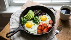 Quick skillet eggs with avocado and black beans for a high-fiber start
